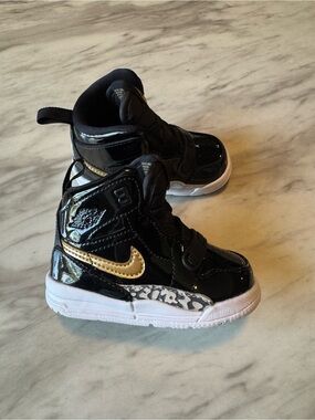 Nike Kids Black Patent High-Top Sneakers with Gold Swoosh